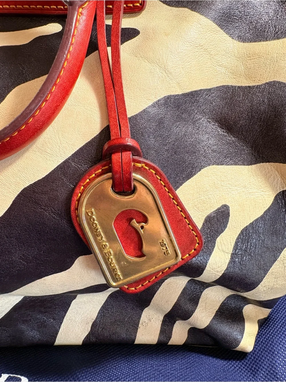 Dooney & Bourke Black and Cream Zebra Satchel with Red Trim